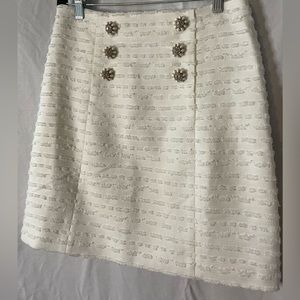 Vintage Off White Skirt with 6 Accent Rhinestones on the front. Size Medium